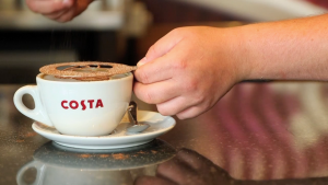 Image of a training video with a Costa store manager.